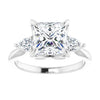 Princess cut three stones engagement ring in white gold