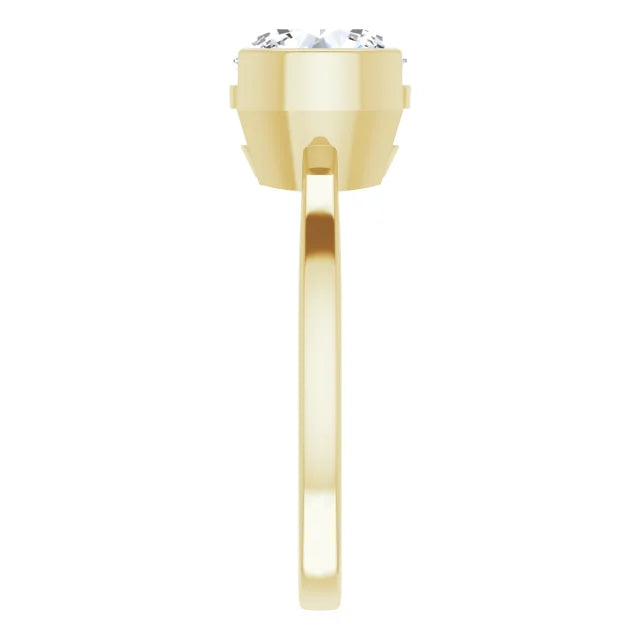 Side view of a round solitaire engagement ring in yellow gold