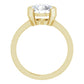 Simple round solitaire engagement ring in yellow gold