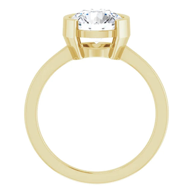 Simple round solitaire engagement ring in yellow gold