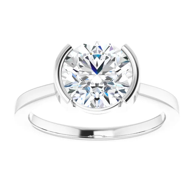Round solitaire engagement ring in white gold