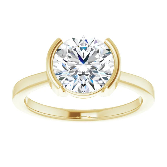 Elegant round solitaire engagement ring in yellow gold
