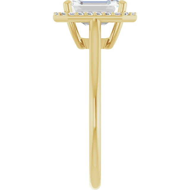 Emerald engagement ring with diamond halo and yellow gold band