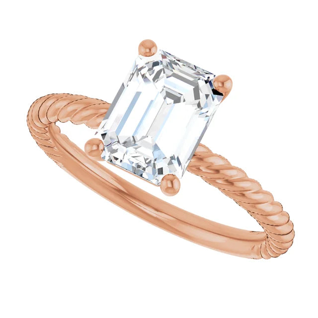 2.15 mm emerald solitaire engagement ring with a twisted rose gold band
