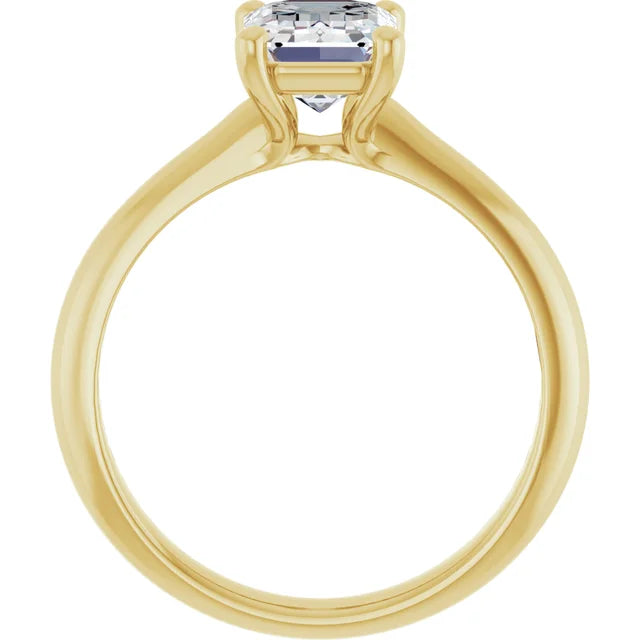 Elegant Emerald Solitaire Engagement Ring in yellow gold band
