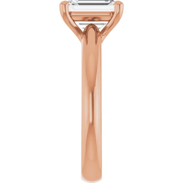 Emerald Solitaire Engagement Ring in rose gold close-up