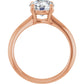 Elegant round solitaire engagement ring in rose gold