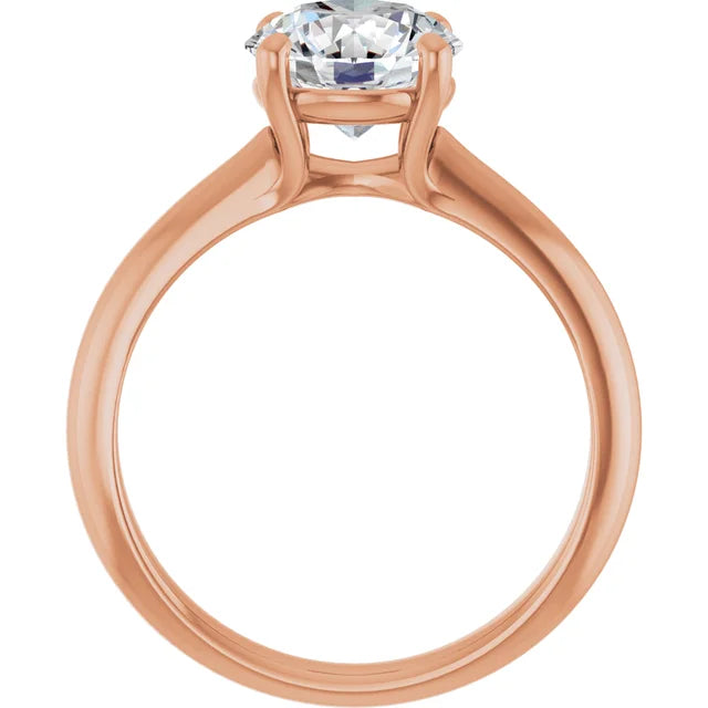 Elegant round solitaire engagement ring in rose gold