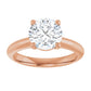 Classic solitaire engagement ring in rose gold