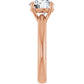 Side view of round solitaire engagement ring in rose gold