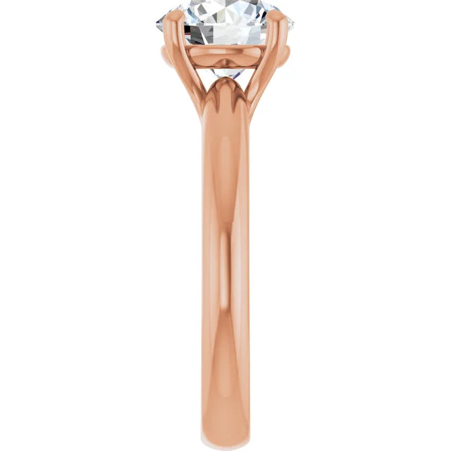 Side view of round solitaire engagement ring in rose gold