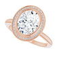 Sparkling Rose Gold Oval Engagement Ring With Halo