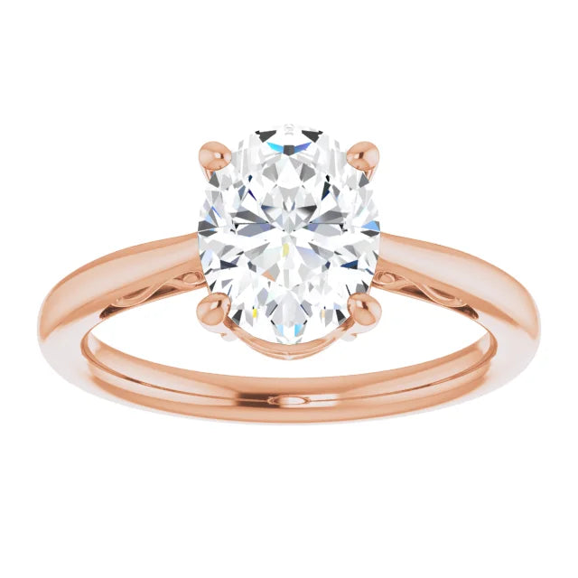 Sophisticated oval solitaire diamond ring in blush rose gold