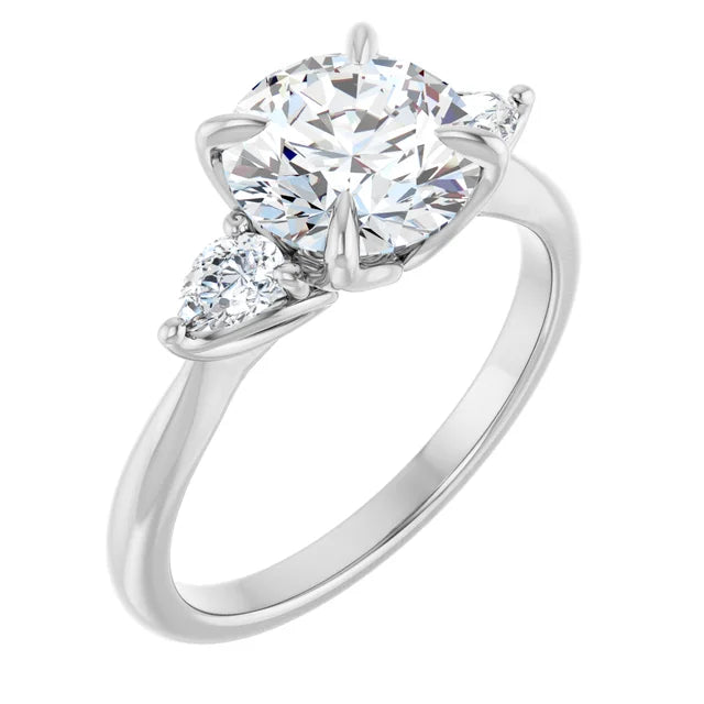 Unique three-stone engagement ring in white gold