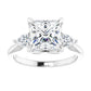 Princess cut three stones engagement ring in white gold