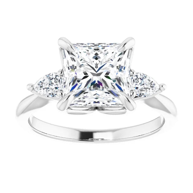 Princess cut three stones engagement ring in white gold