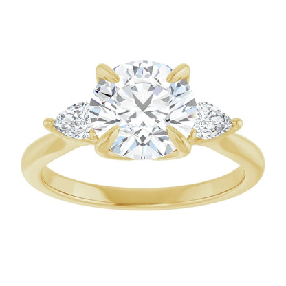 Three-stones engagement ring in yellow gold