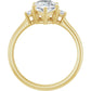 Yellow gold engagement ring with a pear diamond
