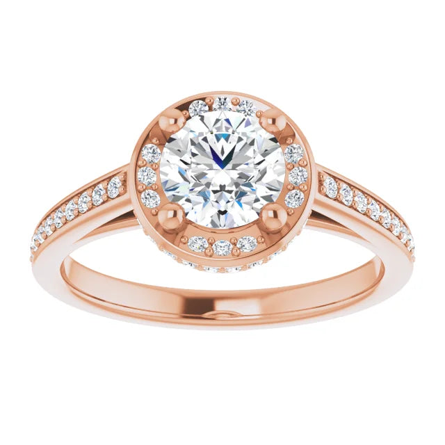 Elegant rose gold engagement ring with halo