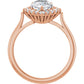 Rose gold pear engagement ring with sparkling diamond accents