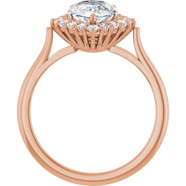 Rose gold pear engagement ring with sparkling diamond accents