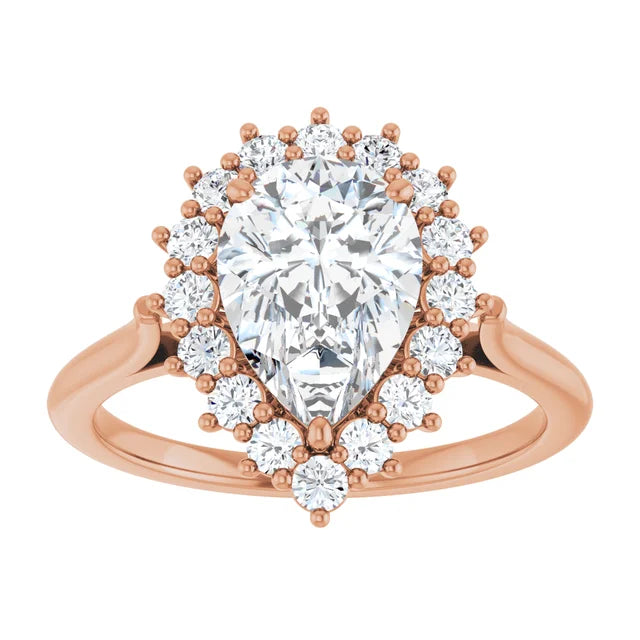 Rose gold engagement ring with pear-shaped diamond