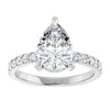 Elegant pear cut halo engagement ring with diamond accents