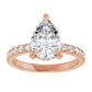 Rose gold pear cut engagement ring with hidden halo