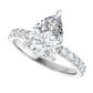 Engagement ring with diamond halo and side diamonds