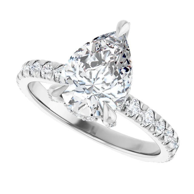 Engagement ring with diamond halo and side diamonds