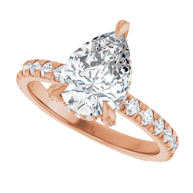 Sleek rose gold pear cut halo engagement ring