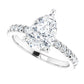 Sparkling white gold pear engagement ring