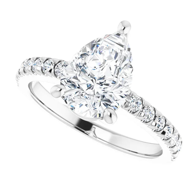 Sparkling white gold pear engagement ring