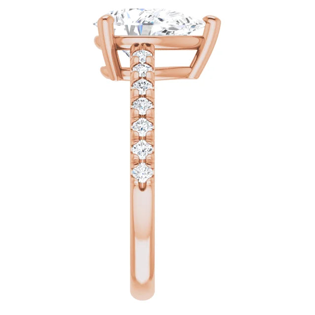 Pear engagement ring with intricate detailing