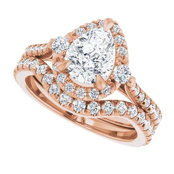 Elegant emerald engagement ring with diamond accents in rose gold