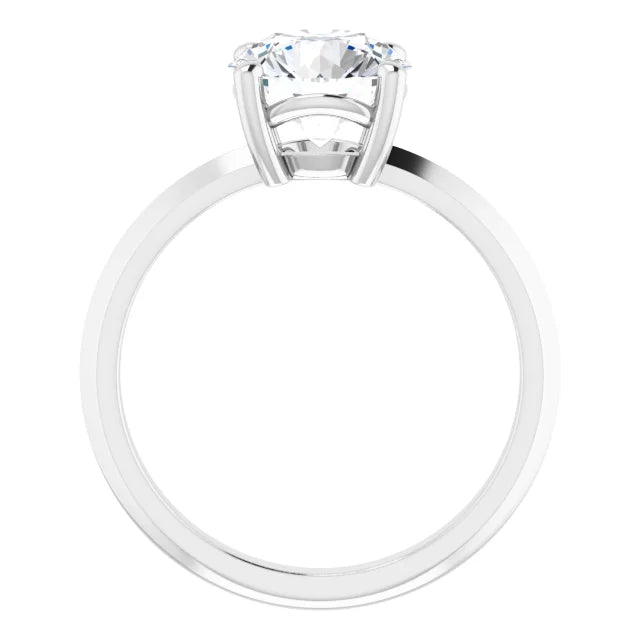 Close-up of a white gold round solitaire ring
