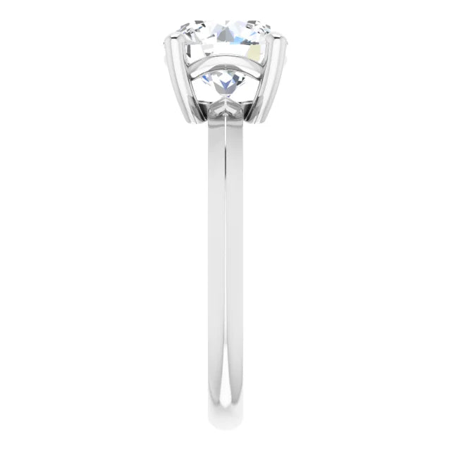 Side view of a white gold round solitaire engagement ring 