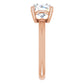 Side view of a rose gold round solitaire engagement ring 